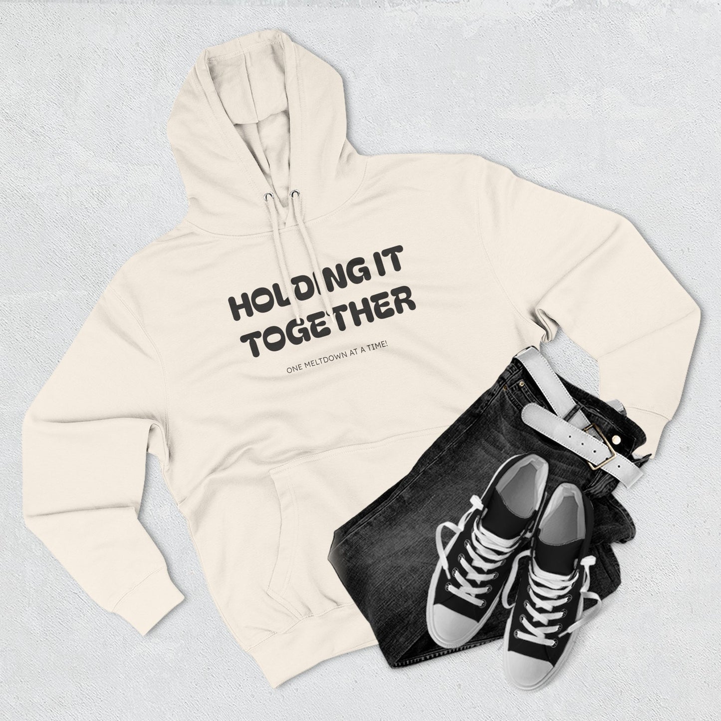 Holding It Together, One Meltdown at a Time” Hoodie – Funny Millennial Parent Sweatshirt