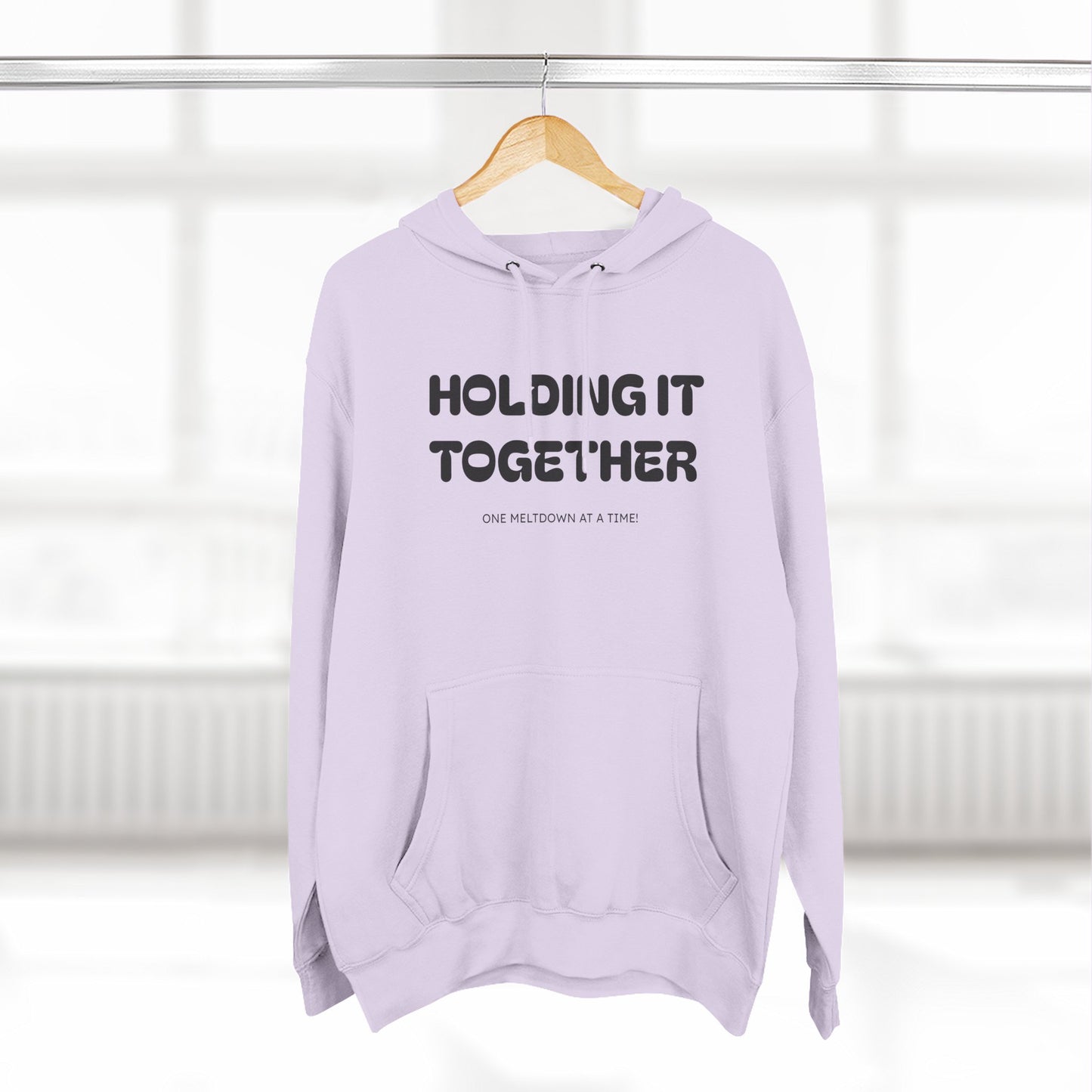 Holding It Together, One Meltdown at a Time” Hoodie – Funny Millennial Parent Sweatshirt
