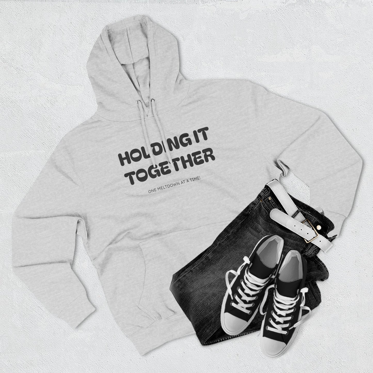Holding It Together, One Meltdown at a Time” Hoodie – Funny Millennial Parent Sweatshirt