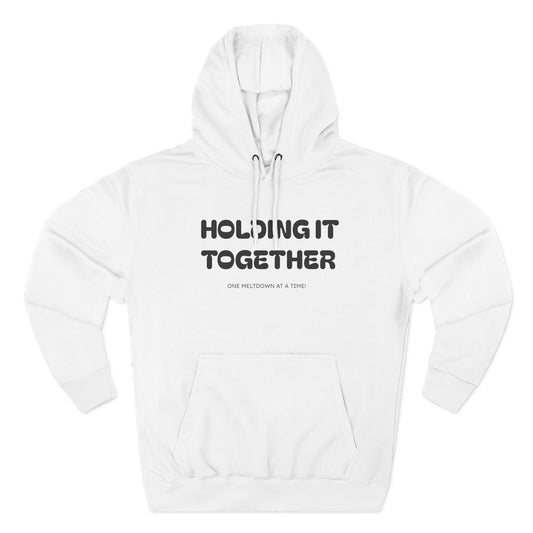 Holding It Together, One Meltdown at a Time” Hoodie – Funny Millennial Parent Sweatshirt