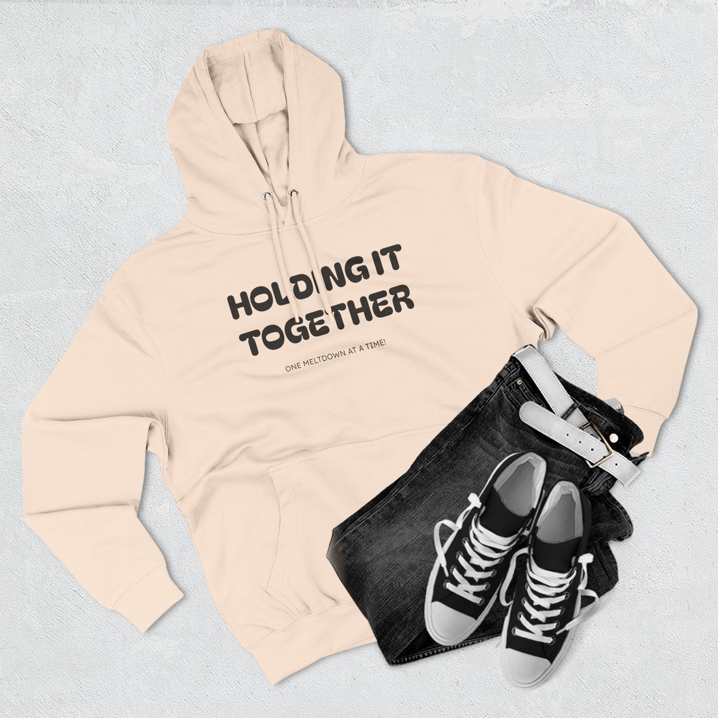 Holding It Together, One Meltdown at a Time” Hoodie – Funny Millennial Parent Sweatshirt